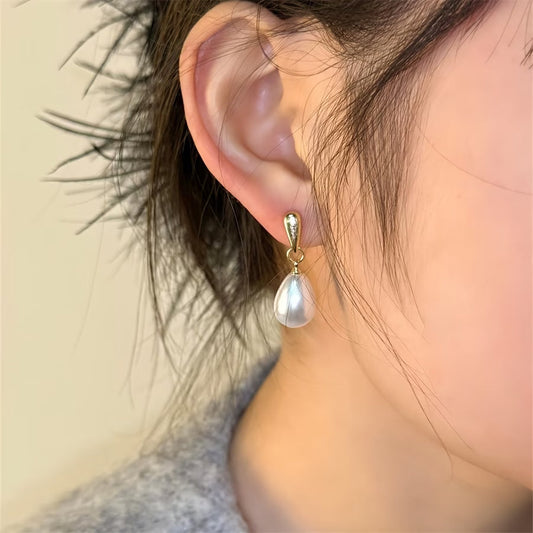 Floating Aretes de Perlas