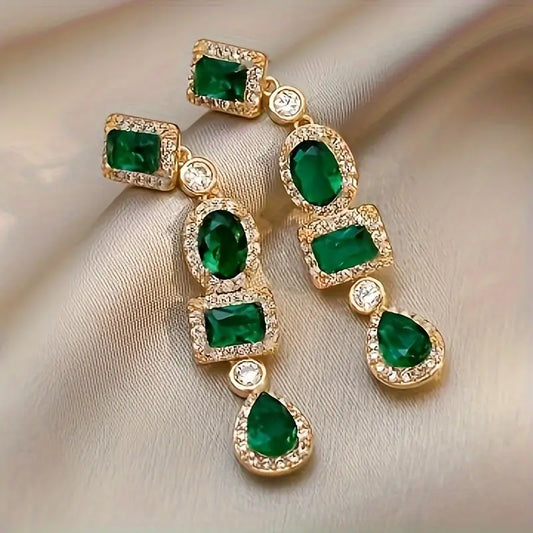 Coraline Esmarisse Dangle Aretes | Oro