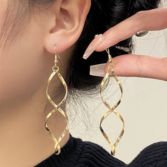 Spiral Dangle Aretes | Oro