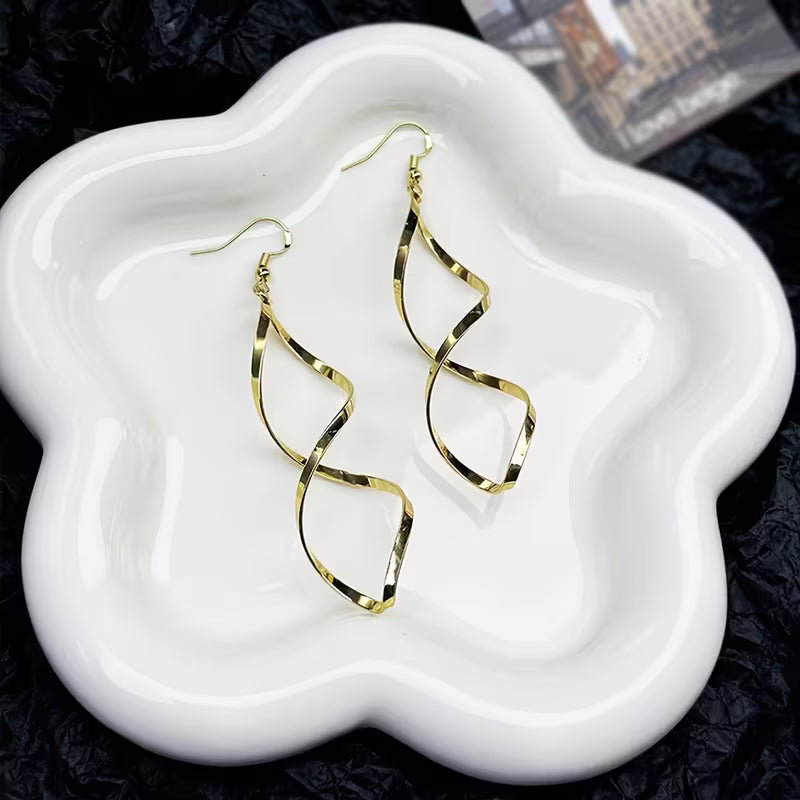 Spiral Dangle Aretes | Oro