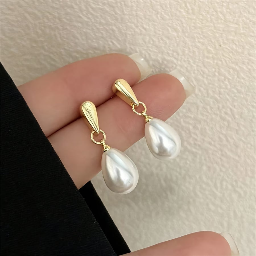 Floating Aretes de Perlas