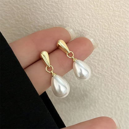 Floating Aretes de Perlas