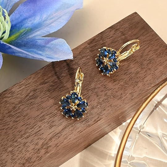 Calina Flower Aretes | Oro