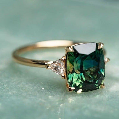 Oro Esmeralda Solitaire Anillo