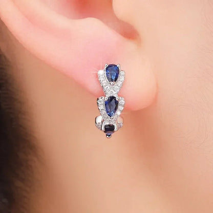 Royal Zafiro Crest Aretes | Blanco Oro