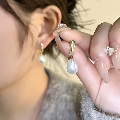 Floating Aretes de Perlas