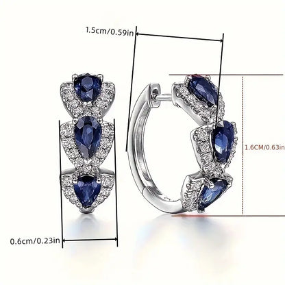 Royal Zafiro Crest Aretes | Blanco Oro