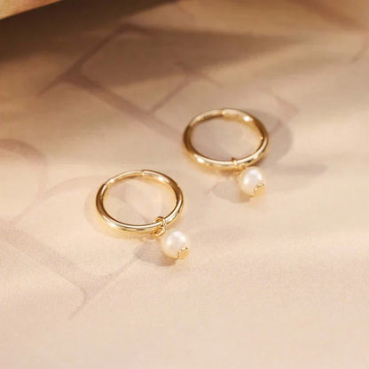 Delia Crest Aretes | Oro