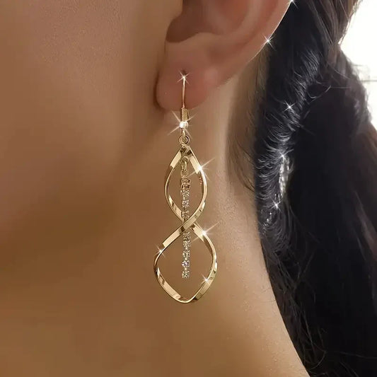 Sunbeam Spiral Aretes | Oro